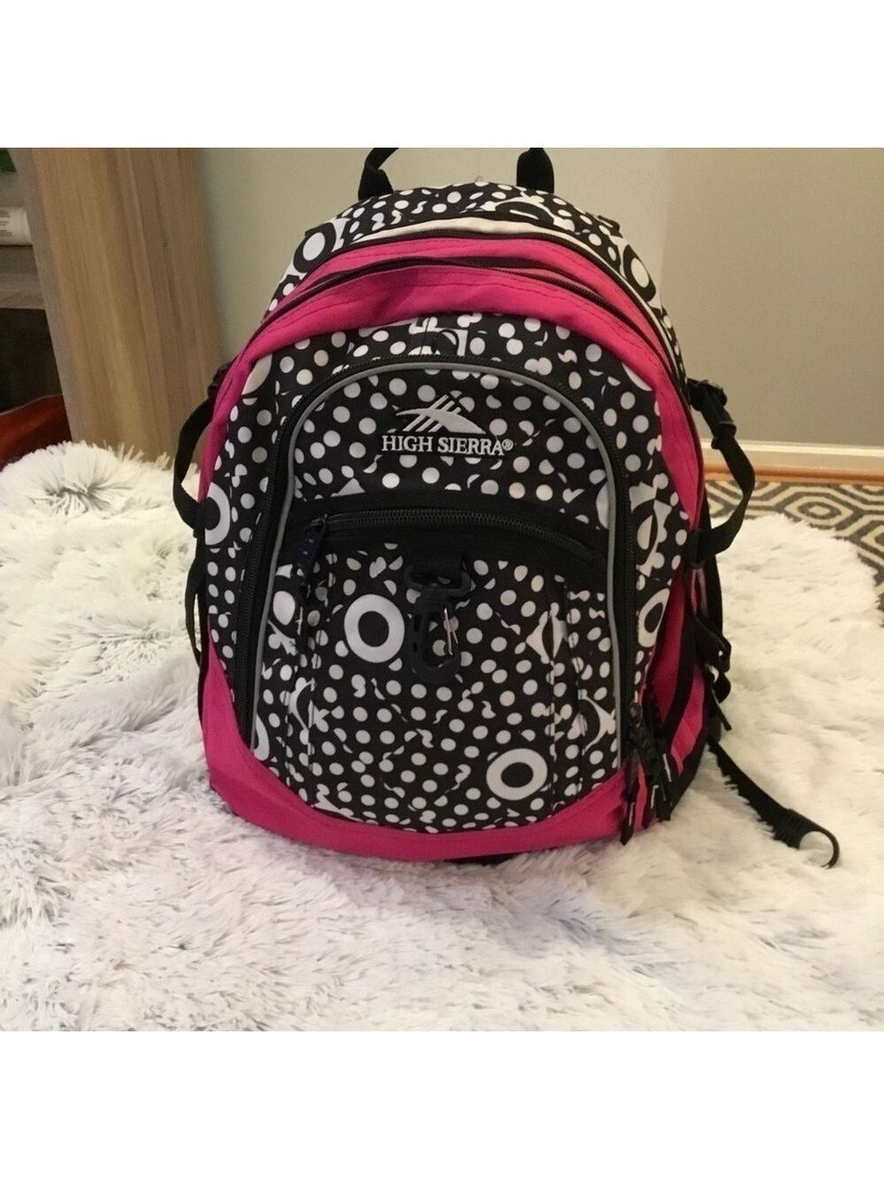 High Sierra pink black and White patterned backpack with suspension stra…